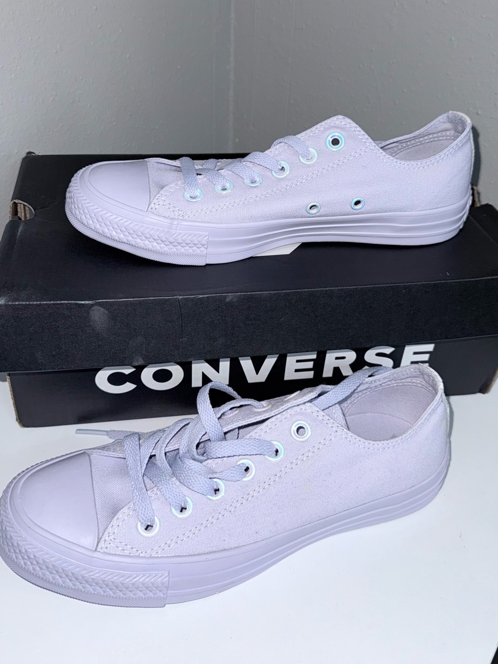 Converse Low Top Canvas Sneakers in light purple